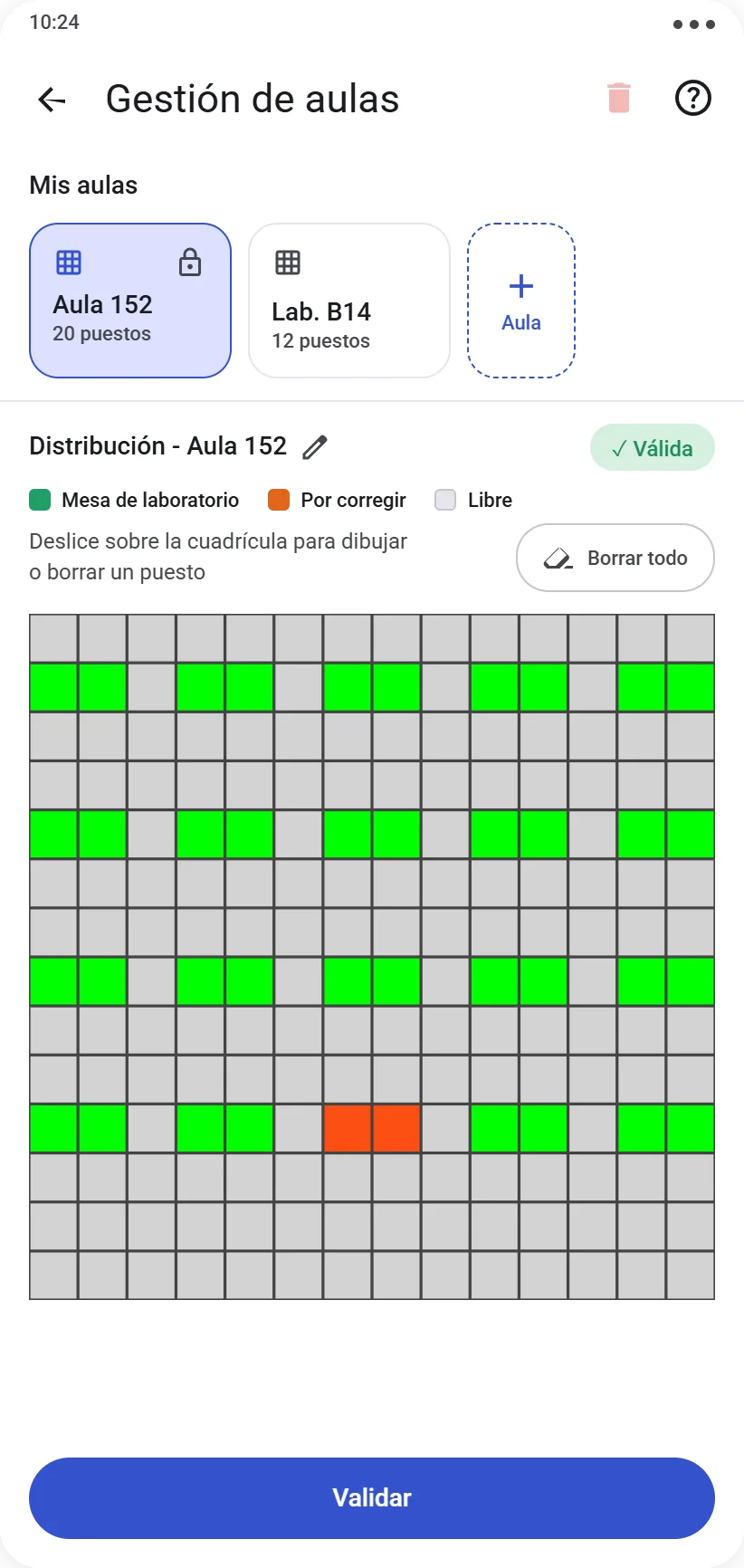 Cuadrícula de disposición del aula con puestos en verde y naranja
